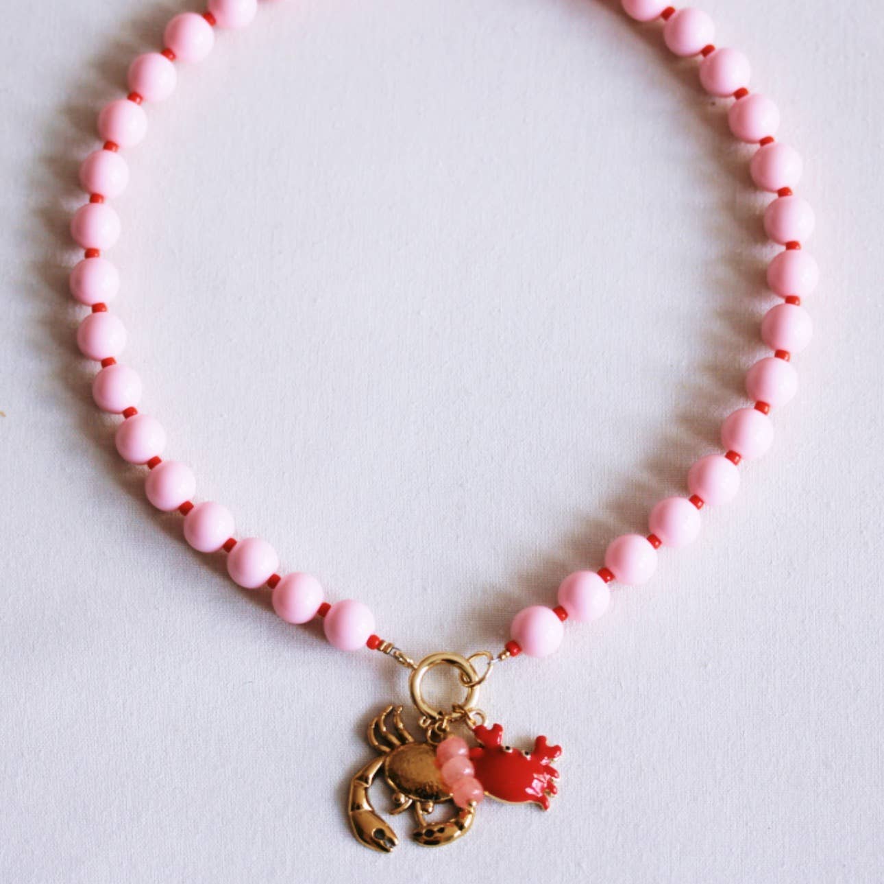 Beaded necklace with Miyuki beads with charms - light pink/r